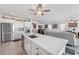 Bright, open-concept kitchen with stainless steel appliances and large island at 4557 E Cactus Canyon Dr, Pahrump, NV 89061