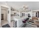 Well-designed kitchen features a large island, stainless steel appliances, and ample storage space in white cabinets at 4557 E Cactus Canyon Dr, Pahrump, NV 89061