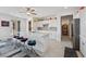 Modern kitchen with a large island, stainless steel appliances, and sleek white cabinetry for a clean look at 4557 E Cactus Canyon Dr, Pahrump, NV 89061