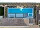 Birds eye view of backyard featuring a long swimming pool, spa, and patio at 472 Windstone Crest Ave, Las Vegas, NV 89138