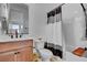 Bathroom featuring a vanity, toilet, bathtub, and shower with a stylish curtain at 472 Windstone Crest Ave, Las Vegas, NV 89138
