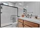 Modern bathroom with a glass shower, floating vanity, and sleek fixtures at 472 Windstone Crest Ave, Las Vegas, NV 89138