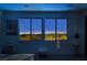 Enjoy breathtaking city lights views at night from the comfort of this bedroom at 472 Windstone Crest Ave, Las Vegas, NV 89138