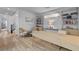Bright office space with a built-in bookcase, light wood floors and minimalist decor at 472 Windstone Crest Ave, Las Vegas, NV 89138
