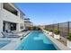 Backyard pool and spa area with patio furniture and mountain views at 472 Windstone Crest Ave, Las Vegas, NV 89138