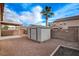 Nice backyard featuring a gravel landscape, a shed, and a covered patio at 5033 Wild Buffalo Ave, Las Vegas, NV 89131