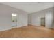 Bedroom featuring wood-look flooring, ensuite bathroom, and closet space at 5033 Wild Buffalo Ave, Las Vegas, NV 89131