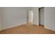 Cozy bedroom featuring wood floors, a closet with sliding doors, and ample natural light at 5033 Wild Buffalo Ave, Las Vegas, NV 89131