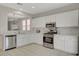 Bright kitchen with stainless steel appliances and subway tile backsplash at 5033 Wild Buffalo Ave, Las Vegas, NV 89131