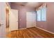 Comfortable bedroom featuring neutral carpet, window with blinds, and a closet at 5332 Polo Grounds St, Las Vegas, NV 89148