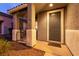 Close-up of a well-maintained front entrance with stone pillars and a welcoming doormat at 5332 Polo Grounds St, Las Vegas, NV 89148