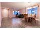 Spacious open-plan living and dining area with tile flooring, providing versatility at 5332 Polo Grounds St, Las Vegas, NV 89148