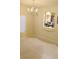 Open dining room features bright light fixture and convenient pass-through to the kitchen at 6339 Sharp Rock Ct, Las Vegas, NV 89139