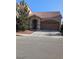 Charming single-story home with a well-manicured front yard and attached two-car garage in a desirable neighborhood at 6339 Sharp Rock Ct, Las Vegas, NV 89139