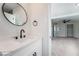 Bathroom with a white vanity and mirror at 6425 Evergreen Ave, Las Vegas, NV 89107