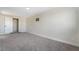 Bedroom showcasing a carpeted floor, white walls, and a closet with a white door at 6425 Evergreen Ave, Las Vegas, NV 89107