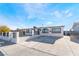 Charming single-story home featuring a gated front yard and a spacious driveway at 6425 Evergreen Ave, Las Vegas, NV 89107