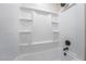 Bright, tiled shower with a white interior, perfect for a clean and refreshing experience at 6425 Evergreen Ave, Las Vegas, NV 89107
