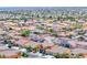 Aerial view of a vibrant residential community featuring well-maintained homes and tree-lined streets at 6617 Fort William St, North Las Vegas, NV 89084