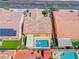 Overhead view of the house, backyard pool and spa with new hardscape and desert landscaping at 6617 Fort William St, North Las Vegas, NV 89084