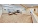 Large bonus room offers ample space for entertainment with neutral carpet, recessed lighting, and cozy furnishings at 6617 Fort William St, North Las Vegas, NV 89084