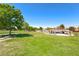 Grassy park grounds with picnic tables and covered seating areas at 6617 Fort William St, North Las Vegas, NV 89084
