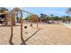 Community playground with swings, slides, and climbing structures at 6617 Fort William St, North Las Vegas, NV 89084