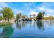 Beautiful pond with a tiered stone waterfall and lovely landscaping at 6617 Fort William St, North Las Vegas, NV 89084
