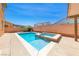 Beautiful backyard pool and spa combination with a well-maintained concrete patio and block wall providing backyard privacy at 6617 Fort William St, North Las Vegas, NV 89084