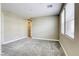 Neutral bedroom with carpet, large window, and ample natural light at 712 Monroe Hill Pl, Henderson, NV 89011