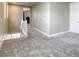 Upstairs carpeted hallway leading to bedrooms and other living areas at 712 Monroe Hill Pl, Henderson, NV 89011