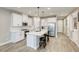 Bright kitchen features a large island with bar seating and modern stainless steel appliances at 712 Monroe Hill Pl, Henderson, NV 89011