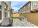 Backyard patio featuring pavers and a small green space at 712 Monroe Hill Pl, Henderson, NV 89011