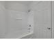 Clean bathroom with a tub and shower combination and white fixtures at 7222 Liberty Pride St, Las Vegas, NV 89148