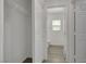 Walk in closet with shelving leading to an adjacent bathroom at 7222 Liberty Pride St, Las Vegas, NV 89148