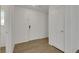 Bright entryway featuring wood-look flooring and white interior doors at 7222 Liberty Pride St, Las Vegas, NV 89148