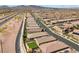 Neighborhood aerial view of homes with privacy backyards, lawns and easy freeway access at 732 Rosewater Dr, Henderson, NV 89011