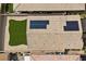 Aerial view of a home highlighting a pristine zero-scaped backyard and solar panels on the roof at 732 Rosewater Dr, Henderson, NV 89011