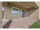 This back patio has a textured concrete foundation and views of the backyard at 732 Rosewater Dr, Henderson, NV 89011