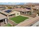 A spacious backyard featuring manicured lawn and block wall fencing for a relaxing outdoor space at 732 Rosewater Dr, Henderson, NV 89011