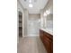Bathroom featuring a glass shower, double vanity, and tiled floor at 732 Rosewater Dr, Henderson, NV 89011