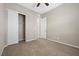 Empty bedroom featuring a closet and wood-look tile flooring at 732 Rosewater Dr, Henderson, NV 89011