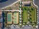 Overhead view of a park area with tennis courts, pickleball courts, and green space with parking at 732 Rosewater Dr, Henderson, NV 89011