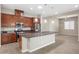Open concept kitchen with stainless steel appliances, large island, and lots of cabinet space at 732 Rosewater Dr, Henderson, NV 89011