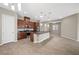 Kitchen with stainless steel appliances, a large island, and open to the living space at 732 Rosewater Dr, Henderson, NV 89011