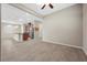 Inviting living area with tile flooring and a view of the open kitchen at 732 Rosewater Dr, Henderson, NV 89011