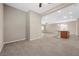 Spacious living area with tile flooring and view of kitchen island at 732 Rosewater Dr, Henderson, NV 89011