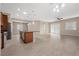 Bright and spacious living room with tile flooring, ceiling fan, and natural light at 732 Rosewater Dr, Henderson, NV 89011