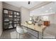 Well-lit home office features a sleek desk, ample storage, and an open layout for productivity at 732 Rosewater Dr, Henderson, NV 89011