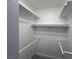 Walk-in closet features built-in shelving and rods at 8455 W Sahara Ave # 258, Las Vegas, NV 89117